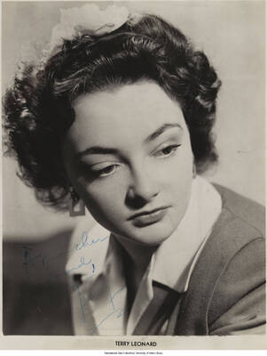 10 x 8 inch signed photograph; Terry Leonard. The photograph is dedicated to Leonard Feather, written in French