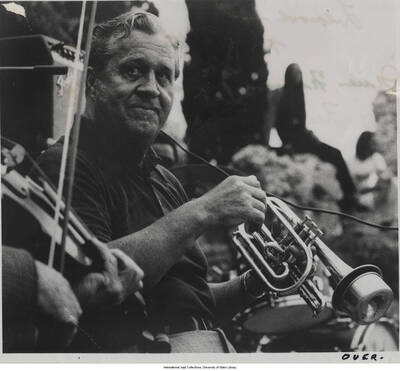 10 x 8 inch signed photograph; Jimmy McPartland. Handwritten on the back of the photograph: This picture was taken at Nice, France, during the 1974 Newport Jazz Festival; that's Joe Venture's violin on the left; 1976-07-06. The photograph is dedicated to Jane and Leonard Feather