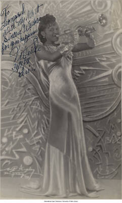 9 1/2 x 7 inch signed photograph; Trumpeter Valaida Snow. The photograph is dedicated to Leonard Feather, dated 1938-08-31, Paris