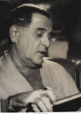 8 x 5 inch photograph; Georgie Auld. Handwritten on the back of the photograph: Jazz Time U.S.A.