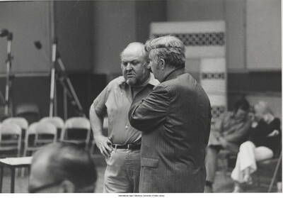 8 x 10 inch photograph; Billy May and Dave Cavanaugh at Time-Life Recording session