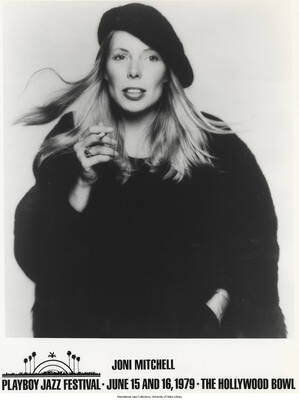 10 x 8 inch photograph; Joni Mitchell. Inscription at the bottom of the photograph reads: Joni Mitchell; Playboy Jazz Festival; June 15-16, 1979; The Hollywood Bowl