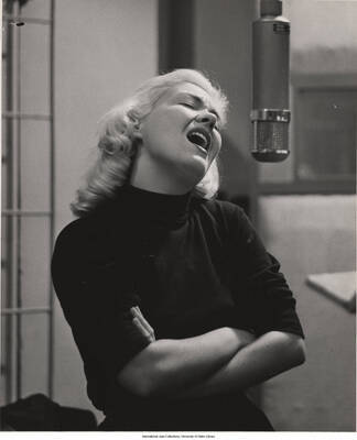 10 x 8 inch photograph; Helen Merrill singing
