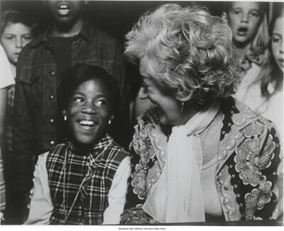 8 x 10 inch photograph; Marian McPartland with children