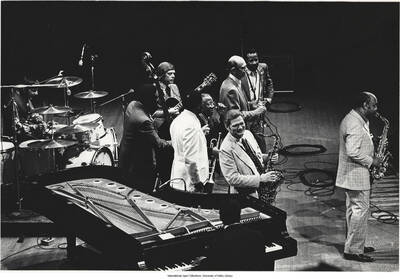 8 x 10 inch photograph; Louie Bellson, Ray Brown, Mundell Lowe, Clark Terry, Roy Eldridge, Zoot Sims, Bill Harris, "Lockjaw" Davis, Benny Carter, John Lewis