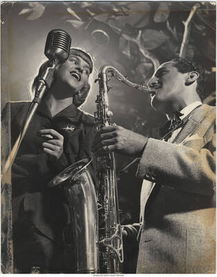14 x 11 inch photograph; Jackie Cain and Charlie Ventura, Royal Roost, NYC, circa 1948