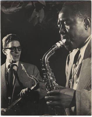 14 x 11 inch photograph; Charlie Parker and Allen Eager, Royal Roost, NYC, 1948