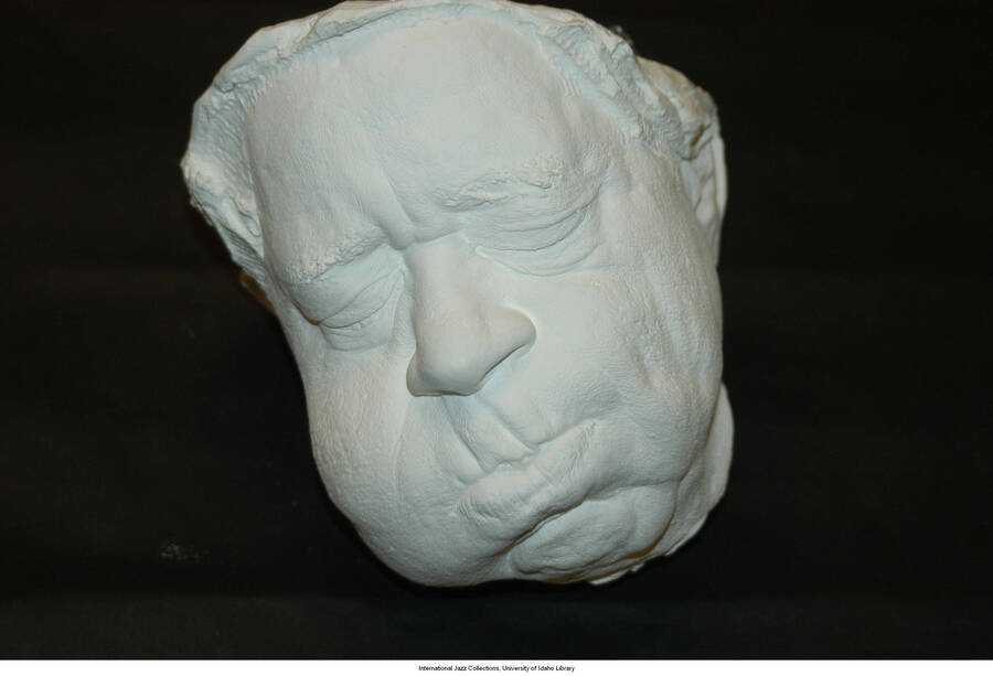 A plaster mask made from Dizzy Gillespie's face while he had inflated his cheeks in a signature fashion.