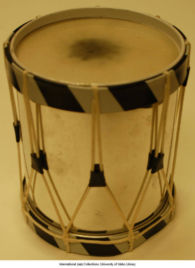 Small metal sided drum.