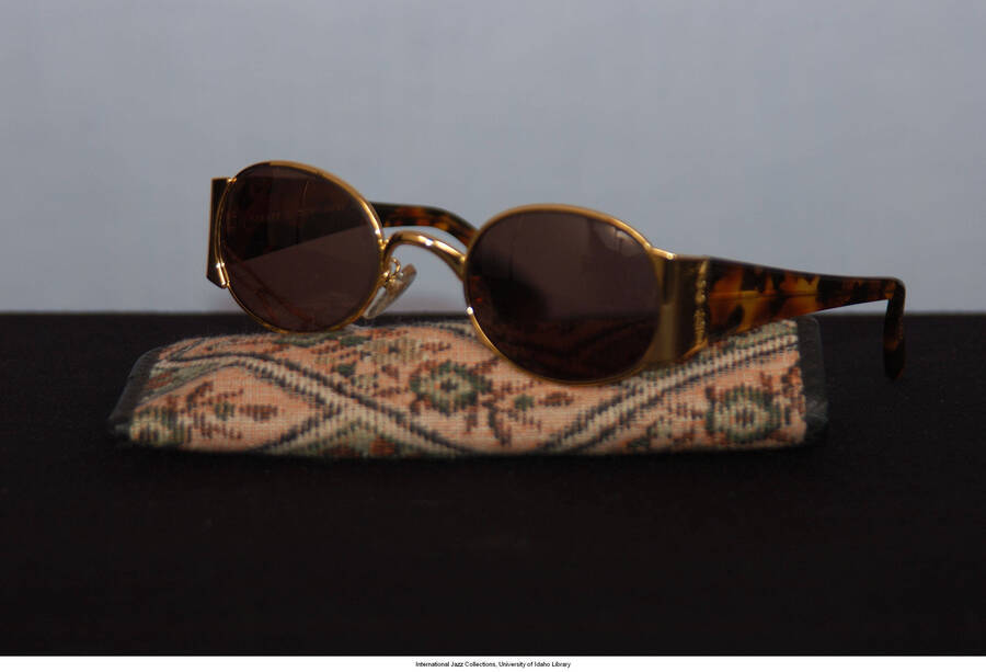 Gold color metal frames w/ ersatz tortoise shell bows.  &quot;&quot;Vogart&quot;&quot; engraved on both sides of frame where they join bows with hinges.  &quot;&quot;Vogart&quot;&quot; by Eastern States model 3089 CE on right bow.  Brocade case w/ opticians name and address printed inside.