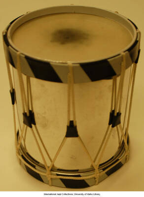 Small metal sided drum.