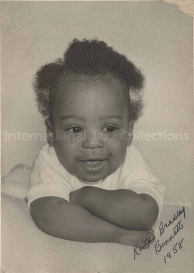 A baby. Handwritten on the lower right corner of the photograph: Keith Bradley Bennett, 1958