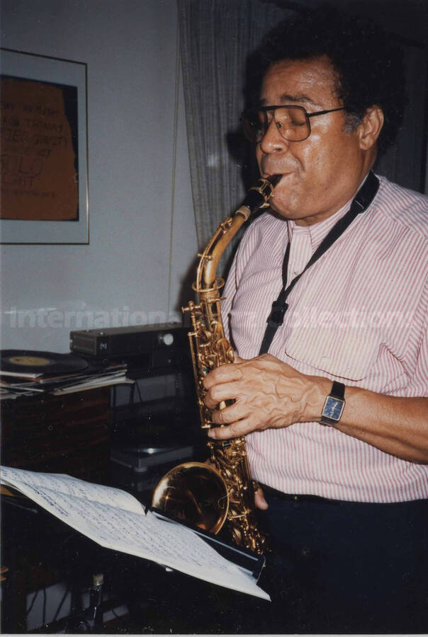 A saxophonist. This photograph has a dedication from Mr. Murakami