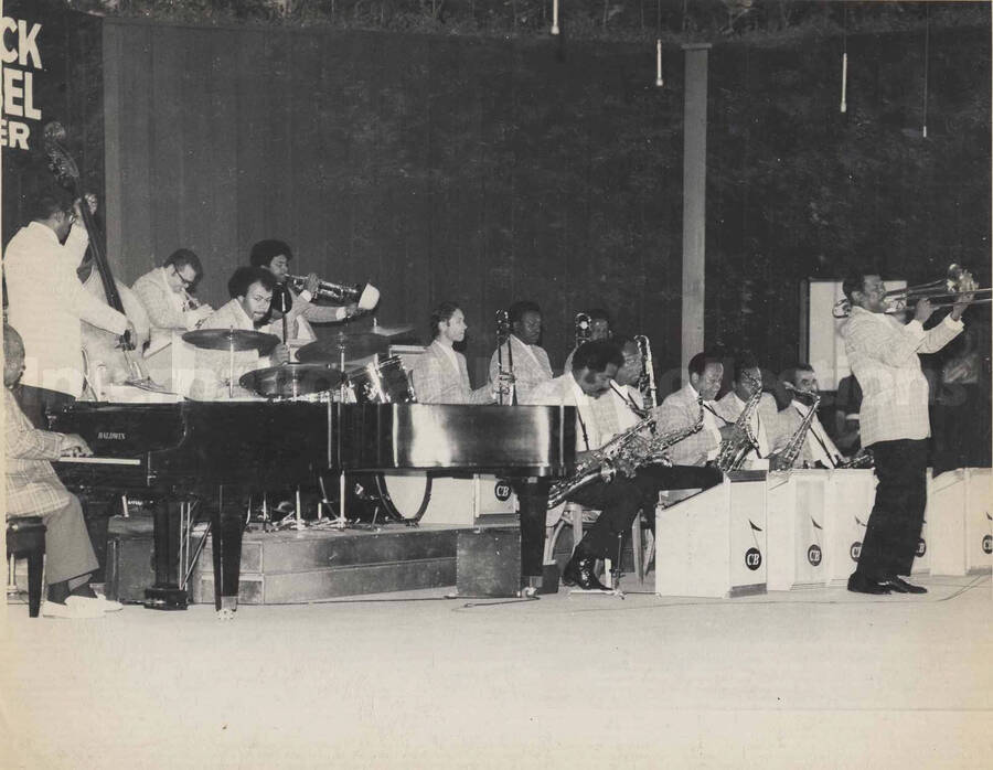 Al Grey performing with the Count Basie's Orchestra. This photograph is pasted on a photo album