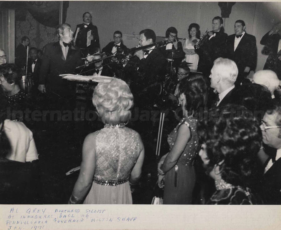 Handwritten on the bottom of the photograph: Al Grey featured soloist at inaugural ball of Pennsylvania Governor Milton Shapp, 1971-01. This photograph is pasted on a photo album