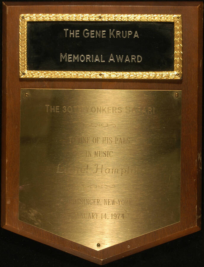 Plaque. 12"x9" Wood finish plaque with two engraved plates The Gene Krupa Memorial Award to Lionel Hampton. The 30th Yonkers Safari. Grossinger, New York. Jan. 14, 1974