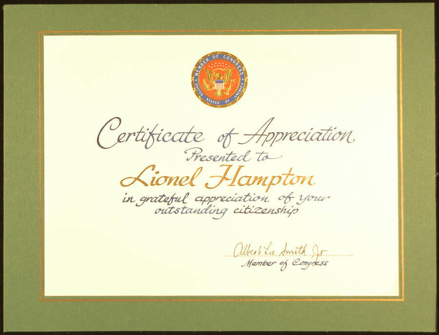Certificate. 8"x11" Certificate with Member of Congress Seal, glued on green cardboard 10 1/4"x13 1/2" Certificate of Appreciation presented to Lionel Hampton in appreciation of his citizenship. Albert Lee Smith, Jr., Member of Congress. [Birmingham, AL], [1981–1983?]