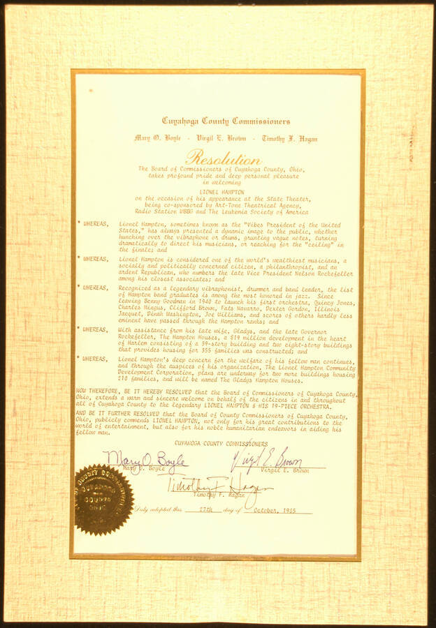 Certificate. 14"x8 1/2" Resolution with gold foil Seal of the Board of County Commissioners on an 16"x11" cardboard under plastic To Lionel Hampton from the Board of Commissioners of Cuyahoga County on the occasion of his appearance at the State Theater, being co-sponsored by Art-Tone Theatrical Agency, Radio Station WBBG and The Leukemia Society of America. County Commissioners. Cuyahoga County, OH