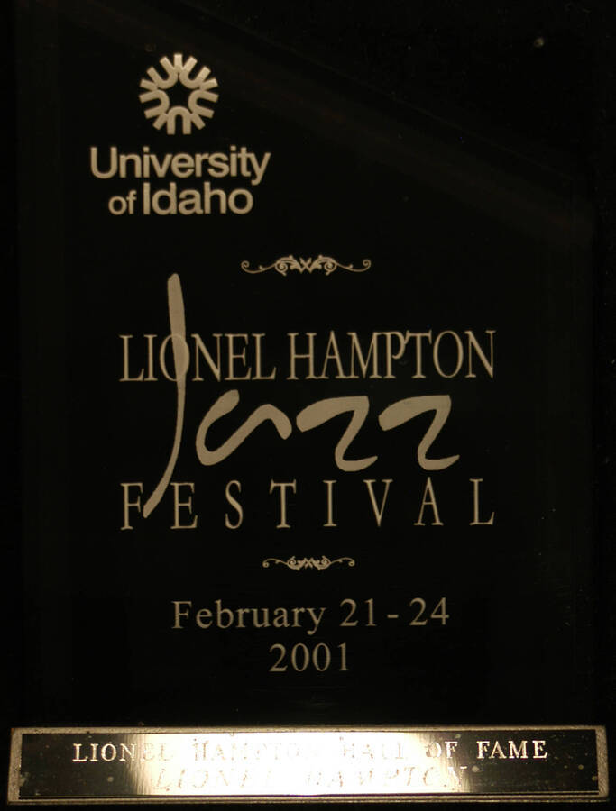 Plaque. 9"x6" Black and clear acrylic engraved plaque on 2 1/2"x6" black wood base with engraved plate that reads "Lionel Hampton Hall of Fame" University of Idaho Lionel Hampton Jazz Festival. Moscow, ID, Feb. 21-24, 2001.