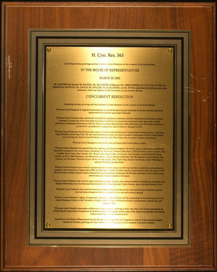 Plaque. 15"x 12" Wood finish plaque with printed double plate To Lionel Hampton from the House of Representatives on the occasion of his 94th birthday. Washington, DC, Mar. 20, 2002
