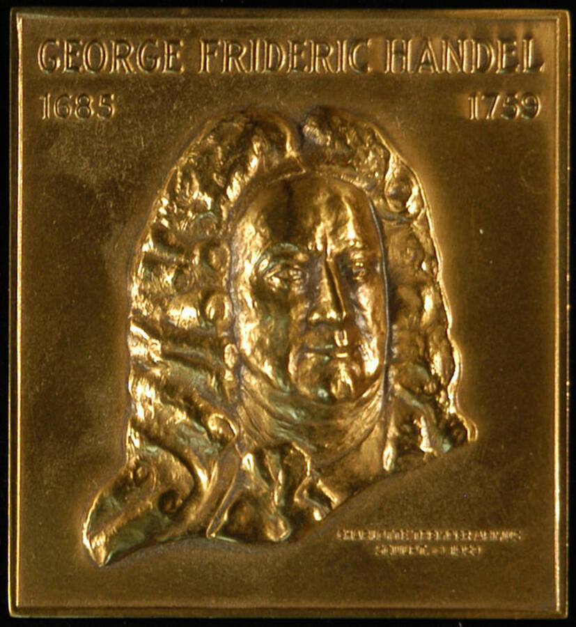 Medal. 3"x2 3/4" Bronze medal featuring on the obverse the bust and the name of "George Frideric Handel" and the years of his birth and death "1685" "1759." On the lower right corner reads: "Charlotte Tremper Armus" "sculpt. © 1959." On the edge it reads "©Medallic Art co.” "Bronze". It is inside a presentation box with the inscription "Medallic Art" on the inside lower right corner of the box lid [From the City of New York, John V. Lindsay, Mayor, 197_?]