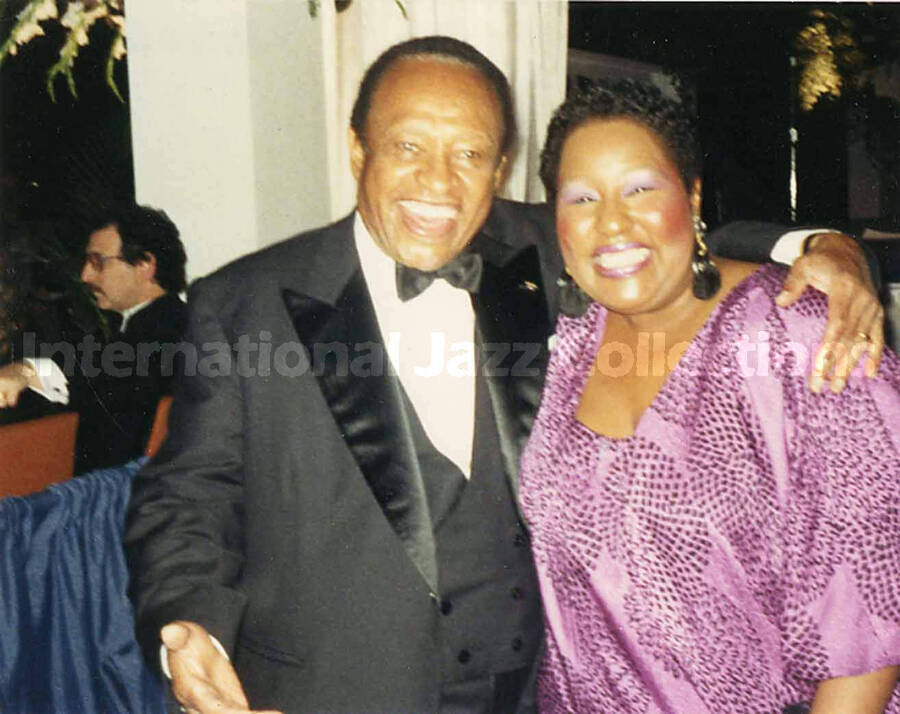 3 1/2 x 4 1/2 inch photograph. Lionel Hampton with unidentified woman, on the occasion of President George H. W. Bush's Inaugural Ball