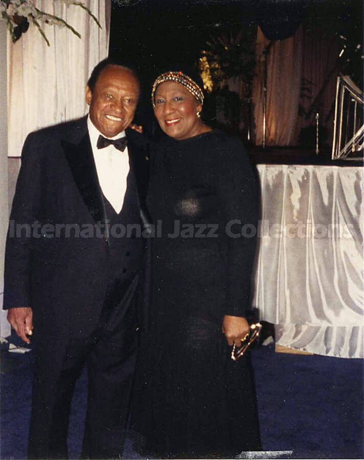 4 1/2 x 3 1/2 inch photograph. Lionel Hampton with unidentified woman, on the occasion of President George H. W. Bush's Inaugural Ball