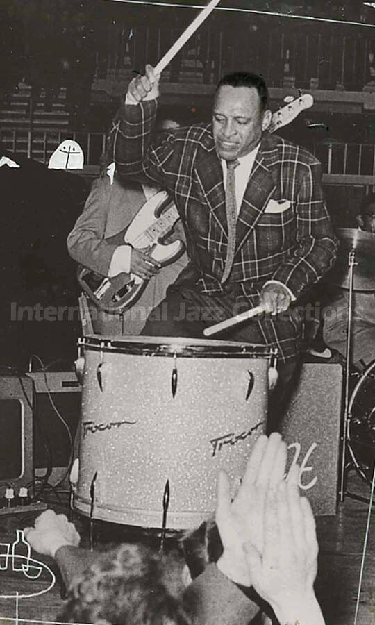 4 1/2 x 3 inch photograph. Lionel Hampton playing Trixon drums