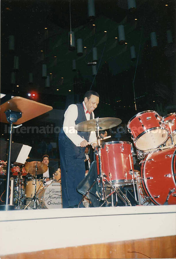 6 x 4 inch photograph. Lionel Hampton playing the drums