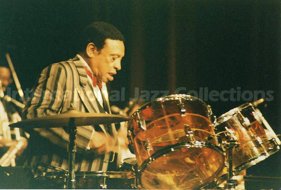 4 x 6 inch photograph. Lionel Hampton playing the drums, in Canada