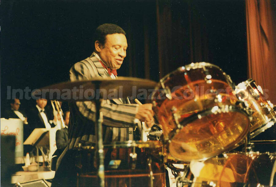 4 x 6 inch photograph. Lionel Hampton playing the drums, in Canada