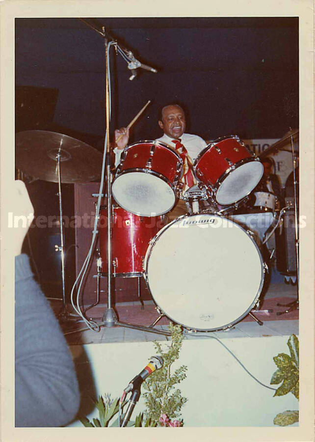 5 x 3 1/2 inch photograph. Lionel Hampton [in France?]. Handwritten on the back of the photograph: Dominique Fouin[?] 24 Place de la Resistance, Tours. 37