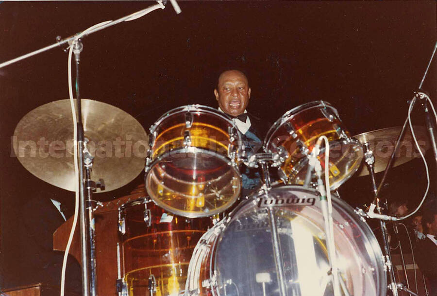 4 x 6 photograph. Lionel Hampton playing the drums. Stamped on the back of the photograph: U.S.A. Jazz Sessions Club, Antwerp, Belgium