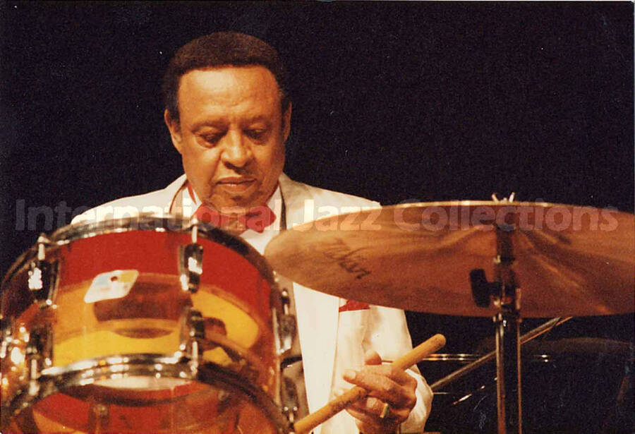 3 1/5 x 5 inch photograph. Lionel Hampton playing the drums