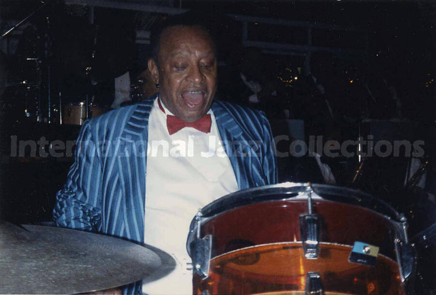 4 x 6 inch photograph. Lionel Hampton performing on drums with orchestra. This photograph is dedicated to Lionel Hampton from Terry
