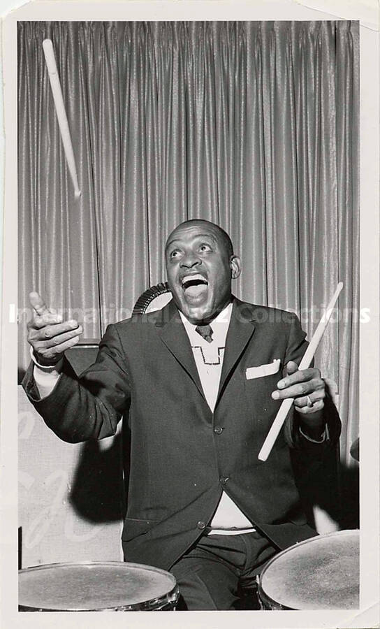 6 1/2 x 4 inch photograph. Lionel Hampton in typical drum act