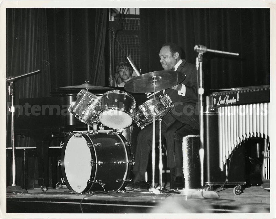 8 x 10 inch photograph. Lionel Hampton playing the drums