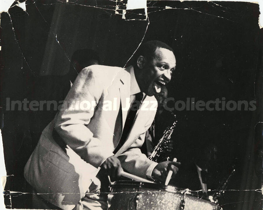 9 1/2 x 12 inch photograph. Lionel Hampton playing the drum