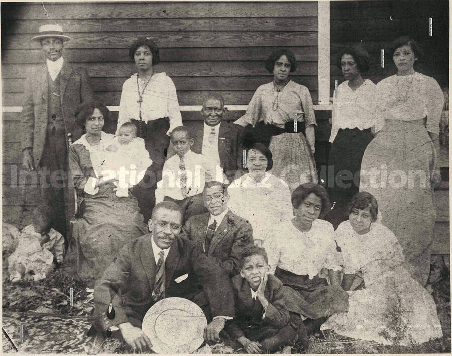 8 x 10 inch photograph. Lionel Hampton, small boy in white shirt and tie, second row, with mother's family, the Morgans