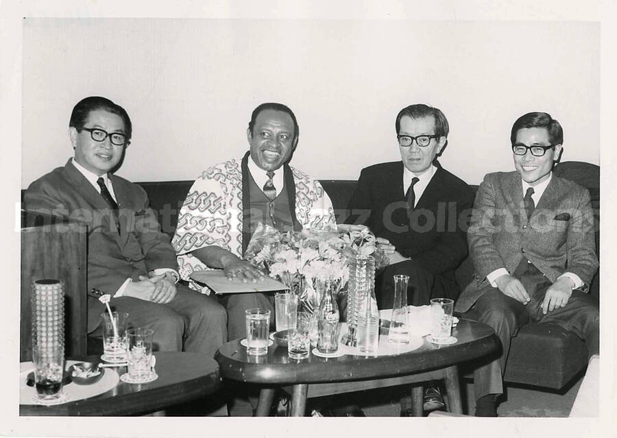 5 x 7 inch photograph. Lionel Hampton with unidentified men, in Tokyo, Japan