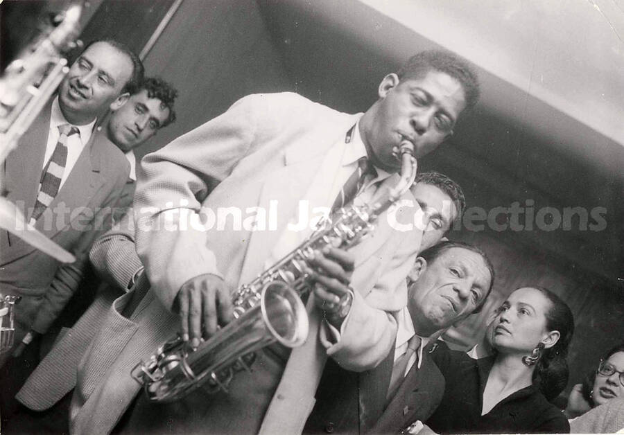 5 x 7 inch photograph. Unidentified saxophonist in Israel. This photograph has inscription on back