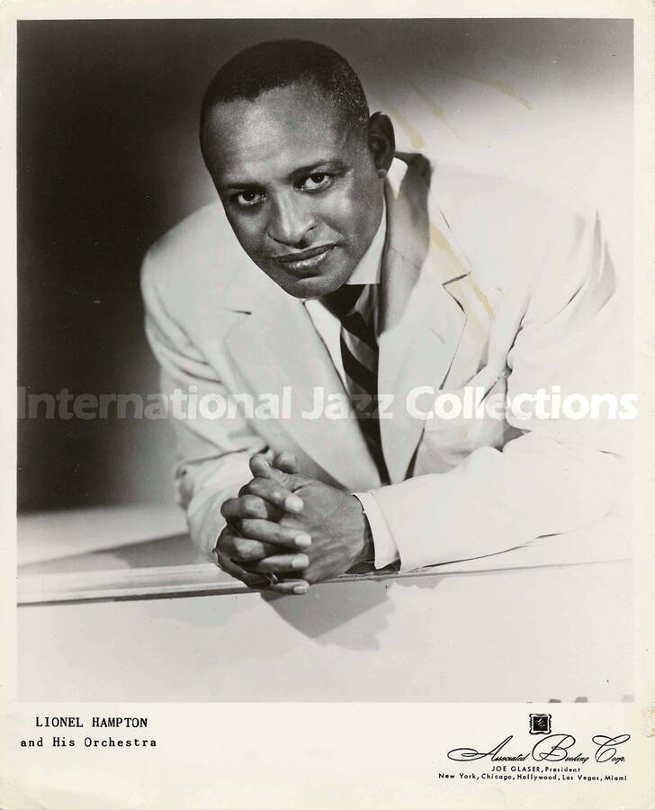 10 x 8 inch promotional photograph. Lionel Hampton. Inscribed at the bottom of the photograph: Lionel Hampton and His Orchestra