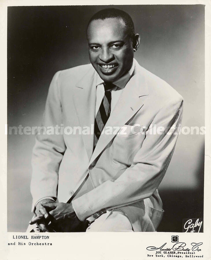 10 x 8 inch promotional photograph. Lionel Hampton. Inscribed at the bottom of the photograph: Lionel Hampton and His Orchestra