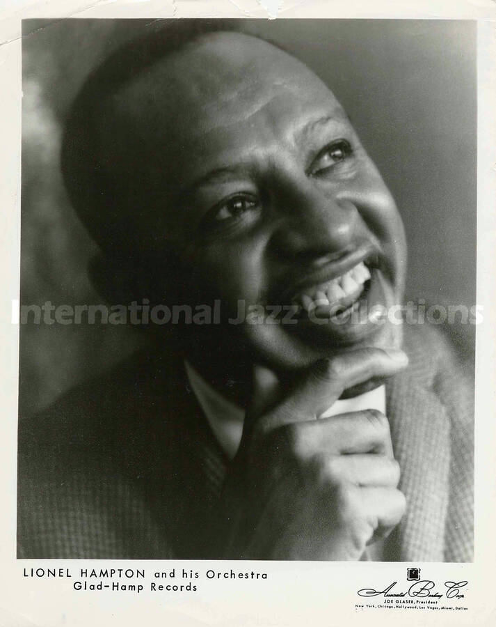 10 x 8 inch promotional photograph. Lionel Hampton. Inscribed at the bottom of the photograph: Lionel Hampton and His Orchestra; Glad-Hamp Records