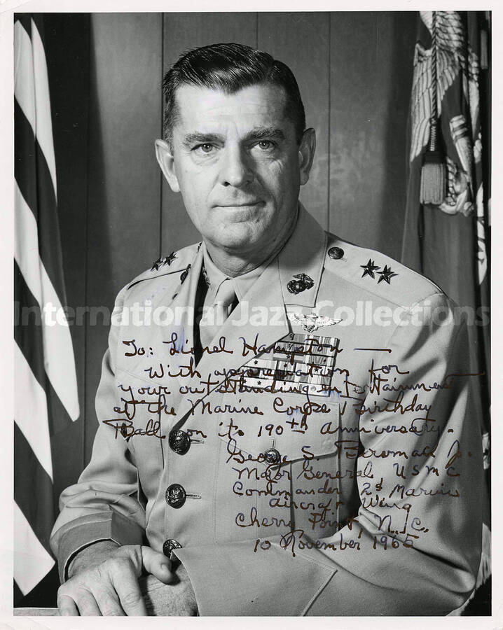 10 x 8 inch photograph. Official portrait of Major General George S. Bowman, Jr. This photograph is dedicated to Lionel Hampton for his performance at the Marine Corps Birthday Ball on its 190th Anniversary; Cherry Point, N.C.