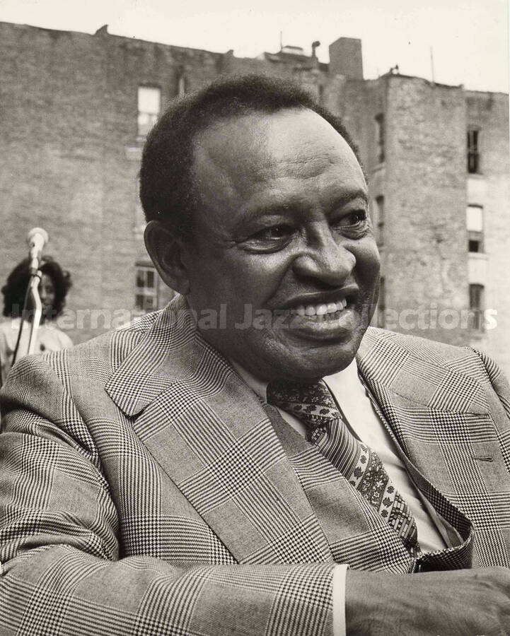 10 x 8 inch photograph. Lionel Hampton on the site of the Lionel Hampton Houses