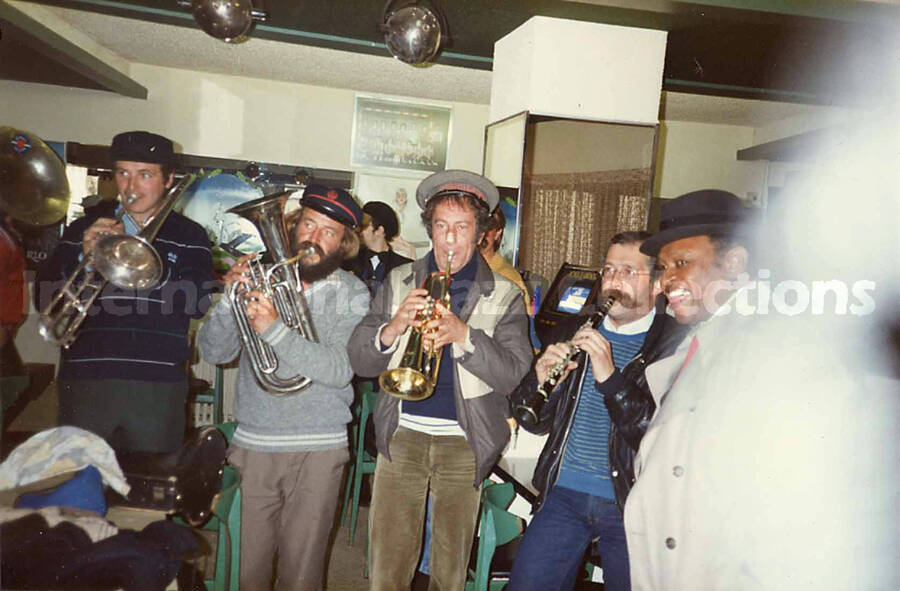 3 1/2 x 5 1/2 inch photograph. Lionel Hampton with the band Les Buccinateurs Reunis in a restaurant in [Bordeaux], France