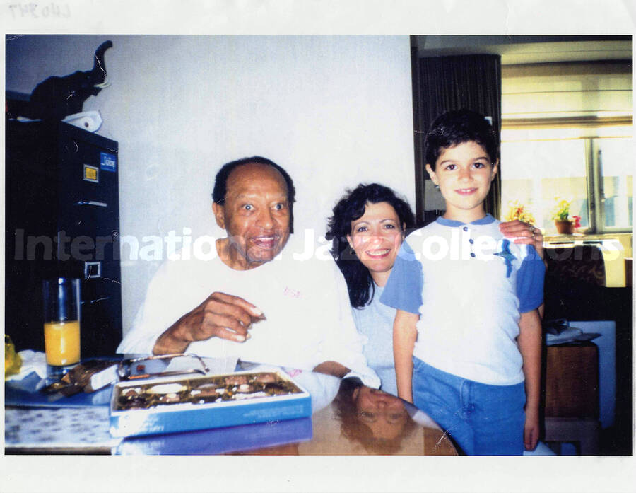 8 1/2 x 11 inch photograph. Lionel Hampton with Angela and Mathew. This is a photocopy of a photograph print