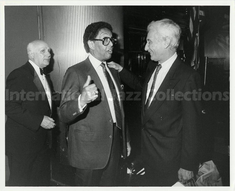 8 x 10 inch photograph. Bill Titone with pianist Dr. Billy Taylor (center) on the occasion Lionel Hampton received the Lifetime Achievement Award of B'nai B'rith, at the Sheraton Centre in New York