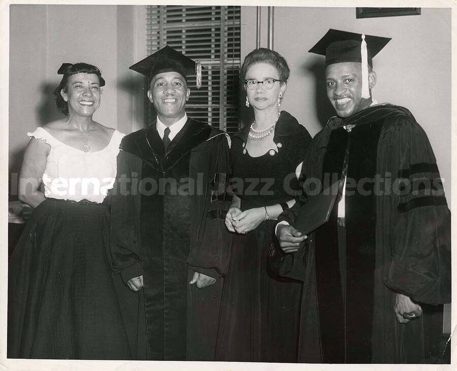 8 x 10 inch photograph. Lionel Hampton with Gladys Hampton, Frank Madison Reid, and Mrs. S. R. Higgins on the occasion of his receiving the degree of Doctor of Music by the Allen University. Columbia, SC